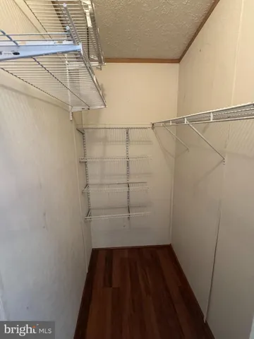 a view of a room with racks on the wall