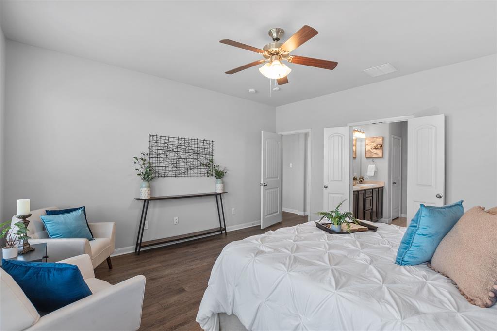 4650 Elderberry Street Forney, TX 75126 - Photo 11 of 31 a bedroom with a bed and window