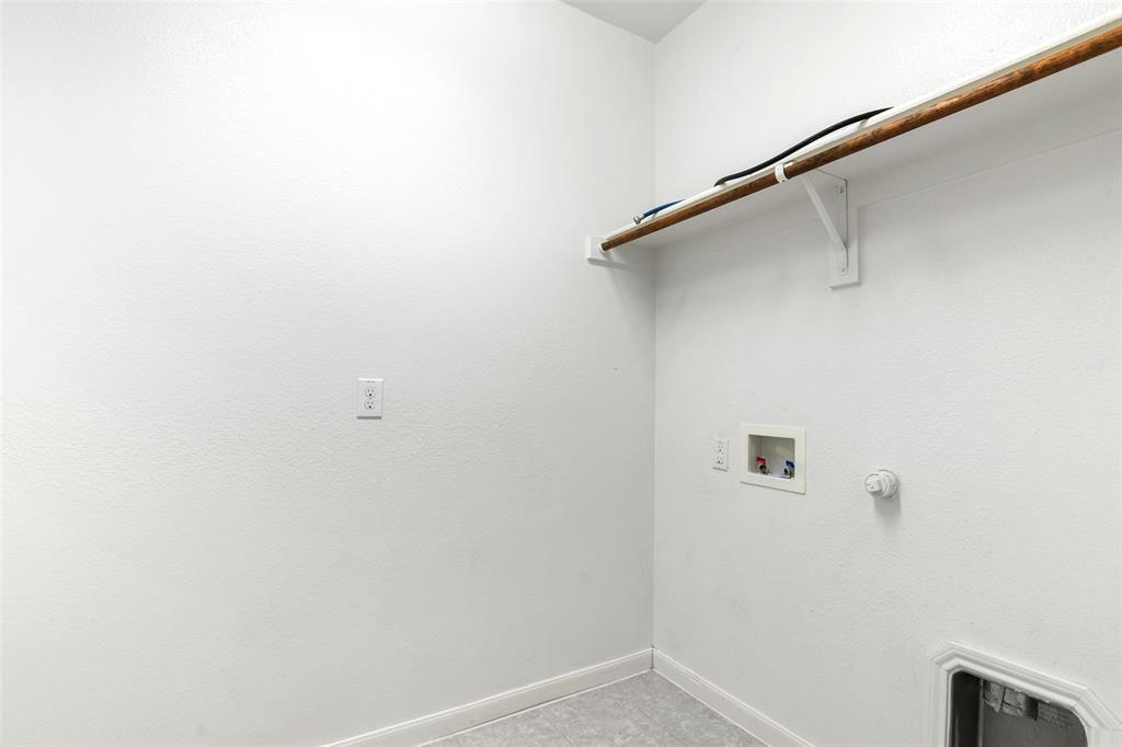 4650 Elderberry Street Forney, TX 75126 - Photo 15 of 31 a view of a rack on the wall