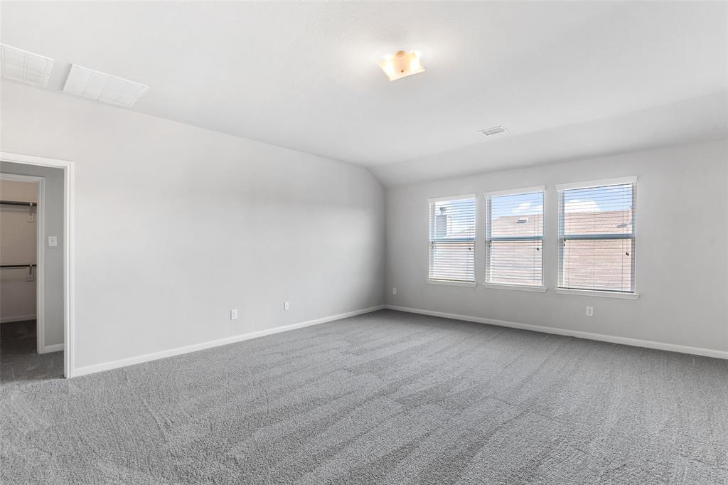 4650 Elderberry Street Forney, TX 75126 - Photo 17 of 31 an empty room with a window