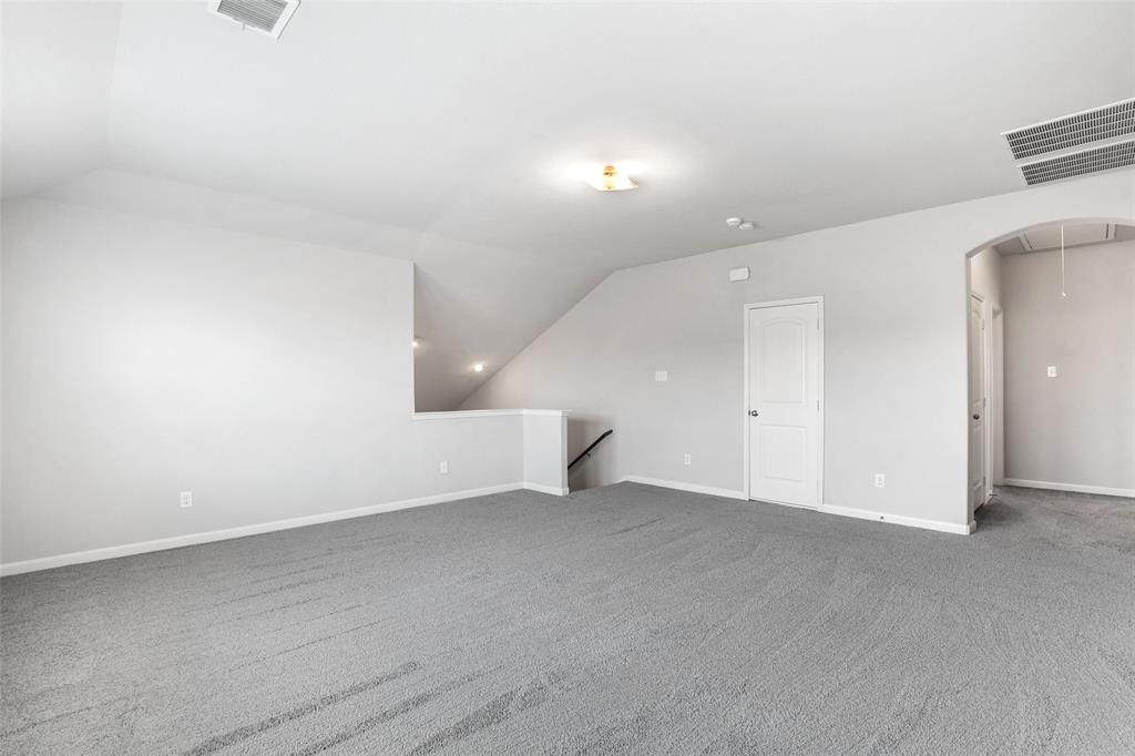 4650 Elderberry Street Forney, TX 75126 - Photo 19 of 31 an empty room with a natural light