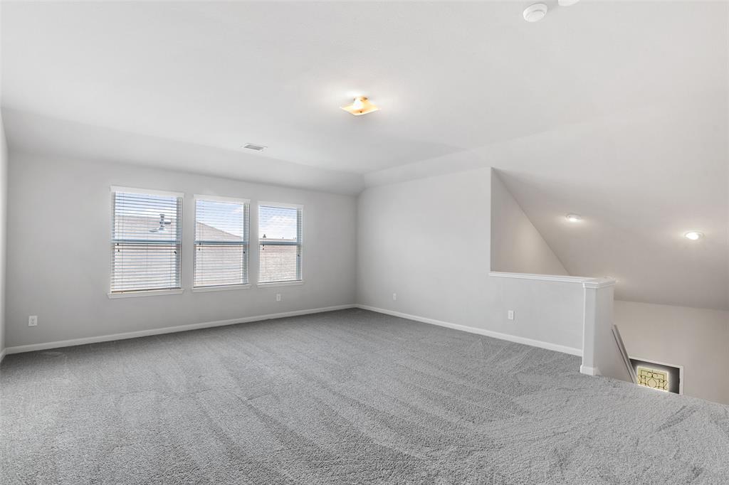 4650 Elderberry Street Forney, TX 75126 - Photo 20 of 31 an empty room with a empty space and window