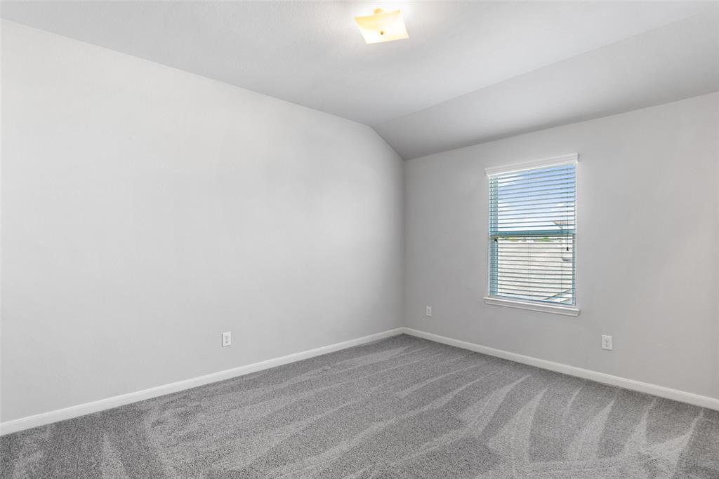 4650 Elderberry Street Forney, TX 75126 - Photo 25 of 31 an empty room with a window