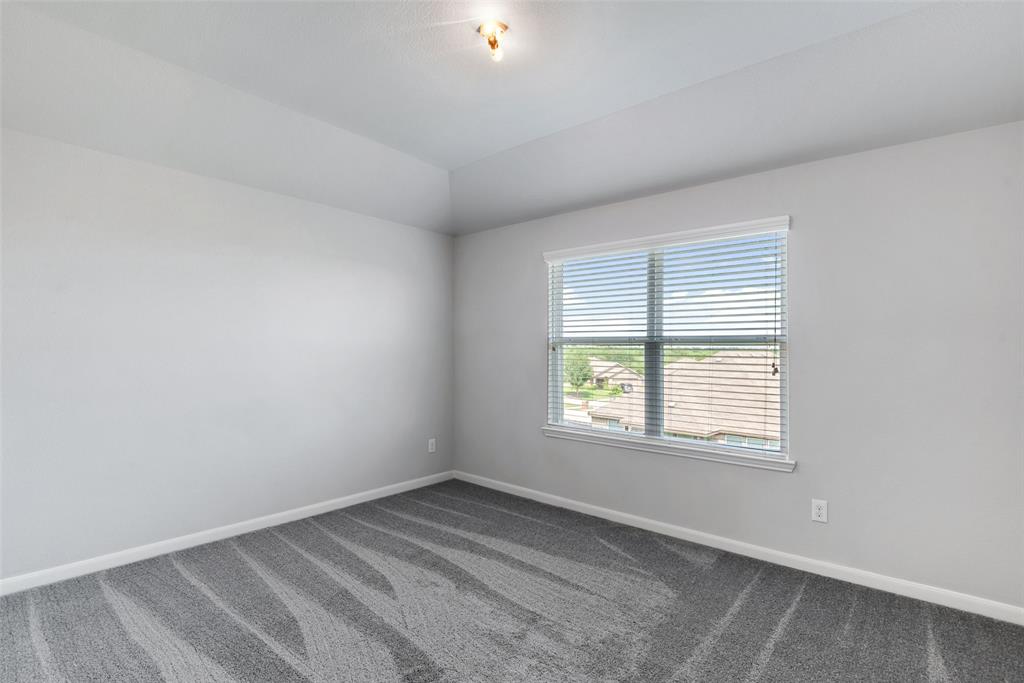 4650 Elderberry Street Forney, TX 75126 - Photo 27 of 31 an empty room with a window