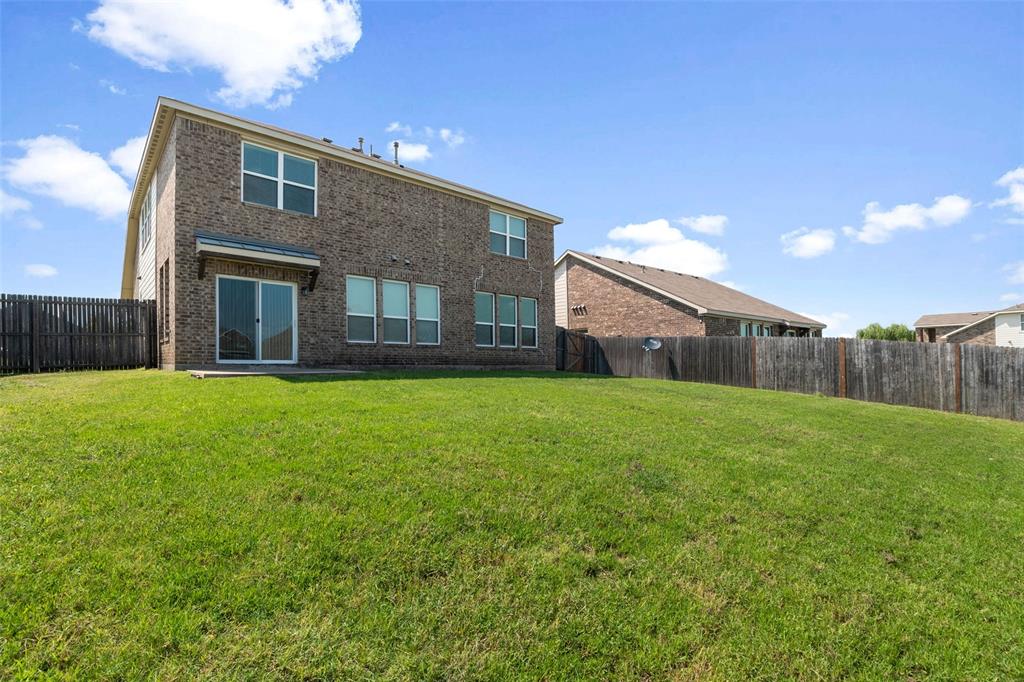 4650 Elderberry Street Forney, TX 75126 - Photo 29 of 31 a house view with a garden space