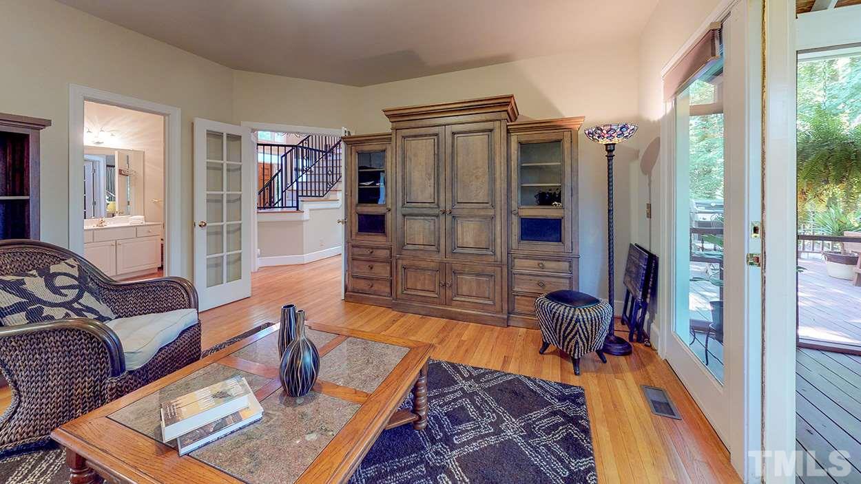3545 Hope Valley Road Durham, NC 27707 - Photo 13 of 30 Currently used as a TV room, it opens to the screened porch and has a full bath and walk-in-closet. It is actually the original master bedroom.