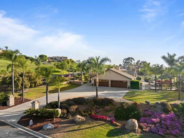 a view of a house with a swimming pool