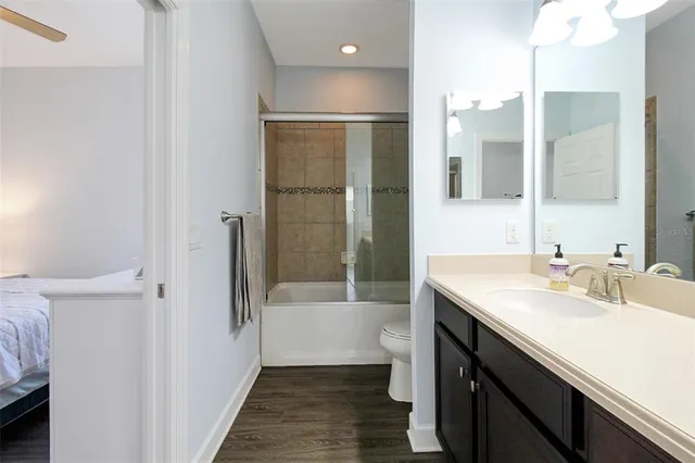 a bathroom with a sink and mirror