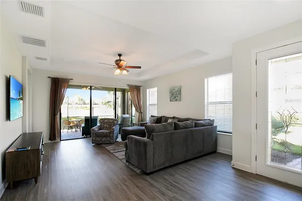 a living room with furniture and a window