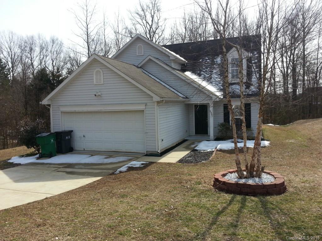 8931 Foggy Meadow Road Charlotte, NC 28269 - Photo 2 of 13 a front view of a house with a yard