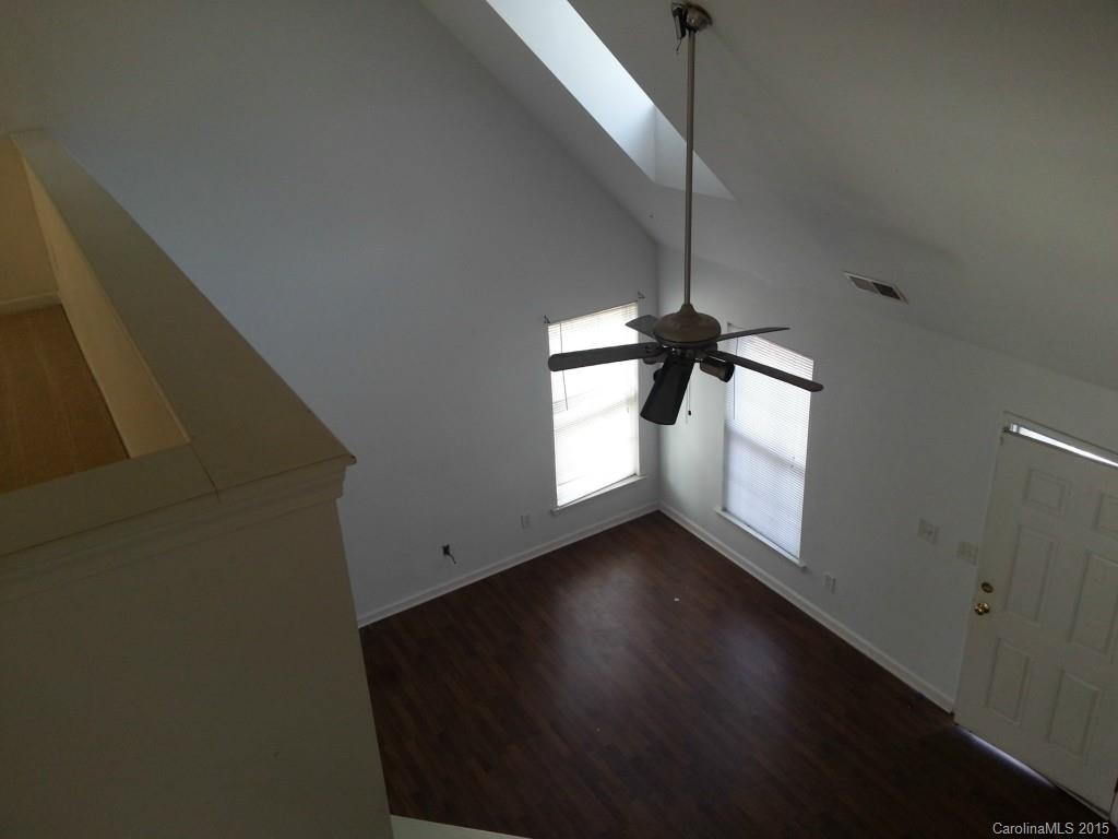 8931 Foggy Meadow Road Charlotte, NC 28269 - Photo 13 of 13 a view of an empty room with a window