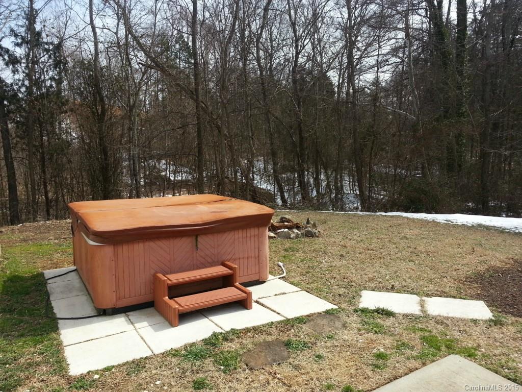 8931 Foggy Meadow Road Charlotte, NC 28269 - Photo 5 of 13 a view of a backyard with swimming pool