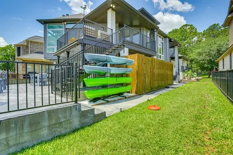 a table and chairs in front of a house