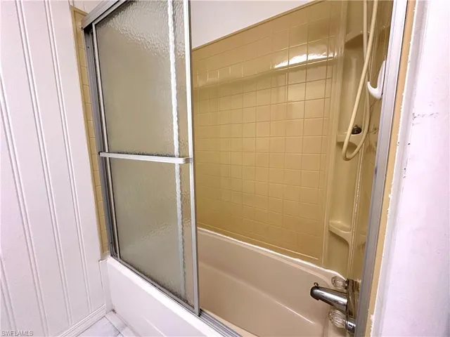 a bathroom with a bathtub