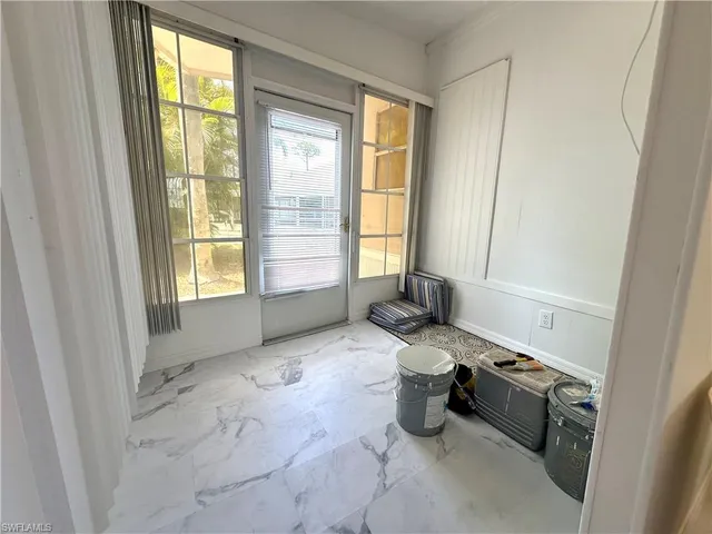 a very nice looking room with a large window