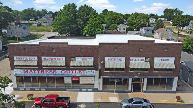 a front view of a building with street view