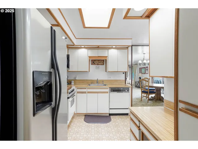 a bathroom with a sink a vanity and a mirror