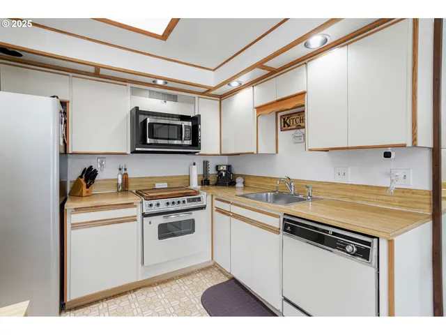 a view of a bathroom from a hallway