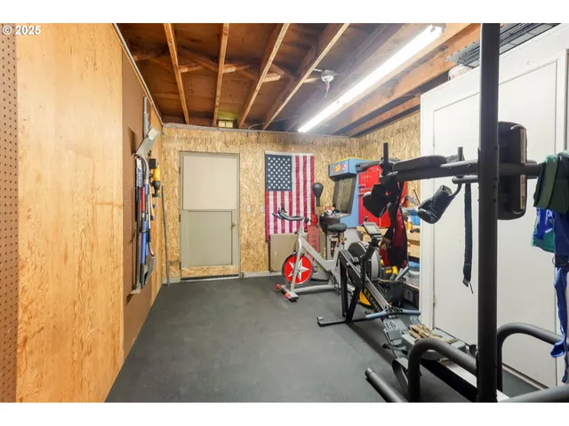 a view of a room with gym equipment
