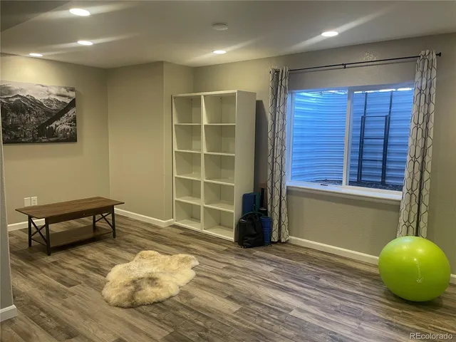 a view of livingroom with furniture and window