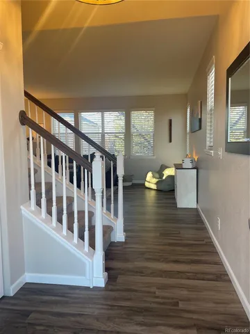 a view of a living room and dining room