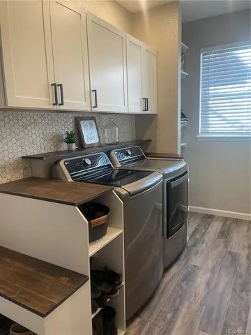 a kitchen with a stove and a sink