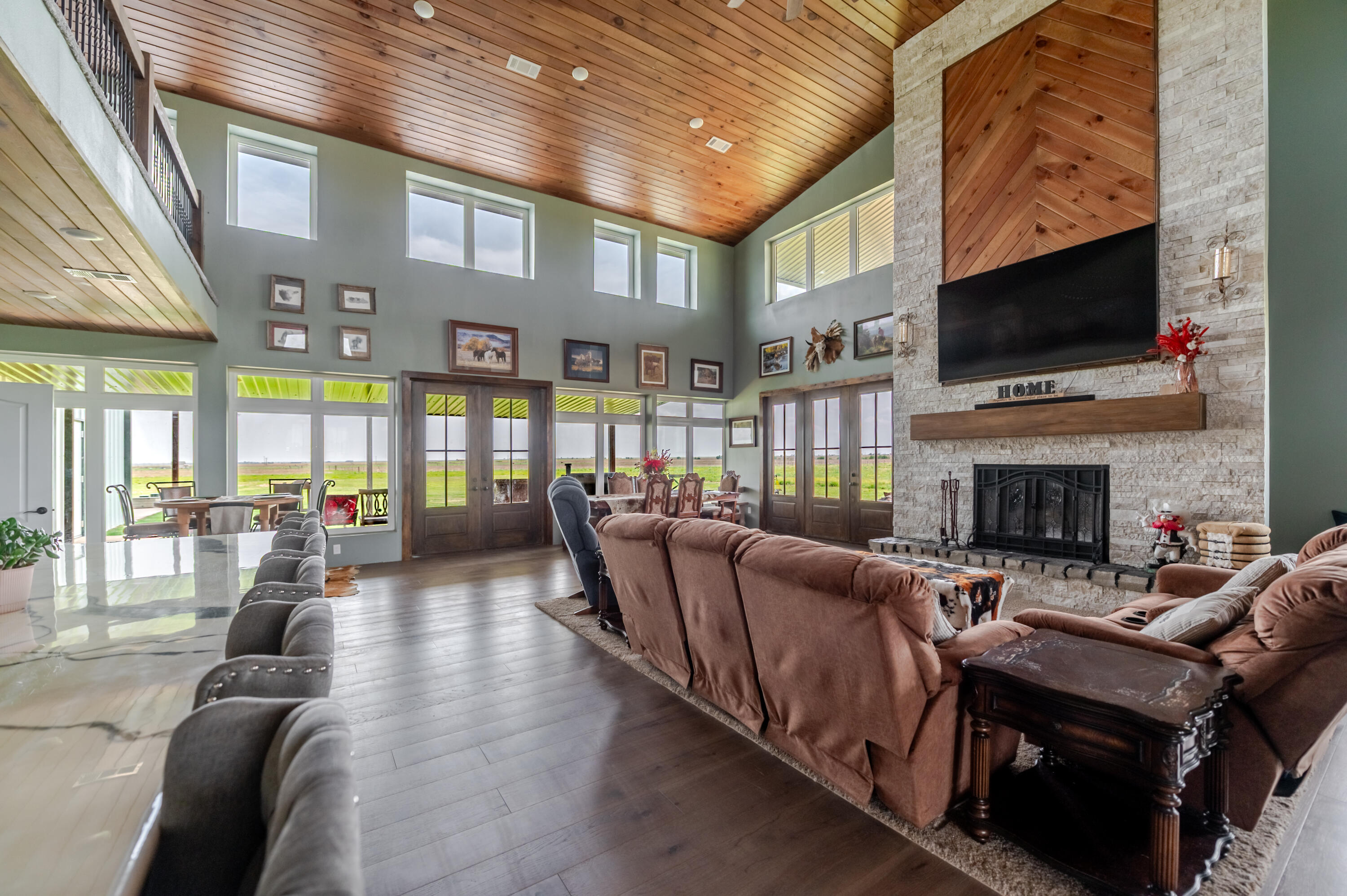 6792 Maine Road Anton, TX 79313 - Photo 8 of 77 a living room with fireplace furniture and a flat screen tv