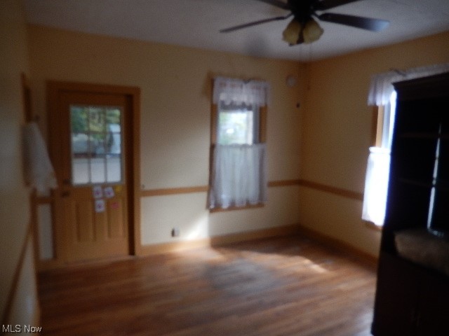 1302 Duncan Street Southwest Massillon, OH 44647 - Photo 8 of 22 Unfurnished room featuring hardwood flooring and ceiling fan