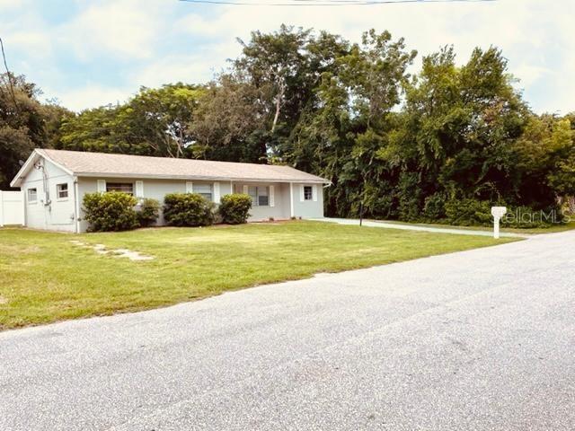 115 Amigos Road DeBary, FL 32713 - Photo 1 of 1 a view of an house with swimming pool and yard