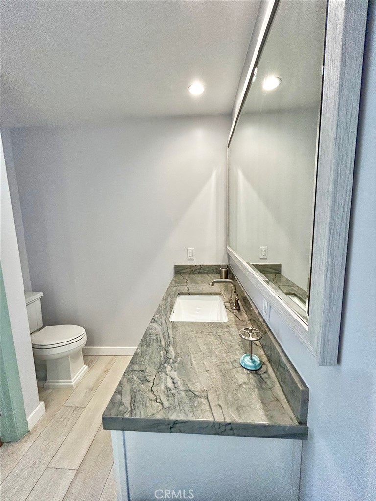 258 West Escalones, Unit 6R San Clemente, CA 92672 - Photo 22 of 37 a bathroom with a sink toilet and shower