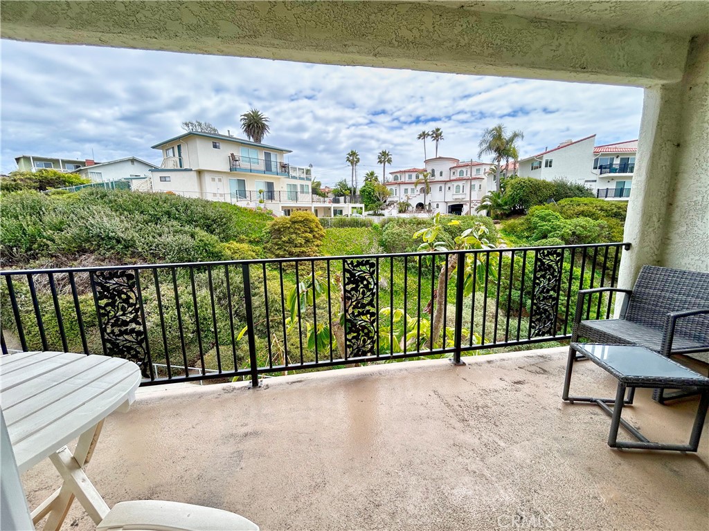 258 West Escalones, Unit 6R San Clemente, CA 92672 - Photo 29 of 37 a view of a terrace with a garden
