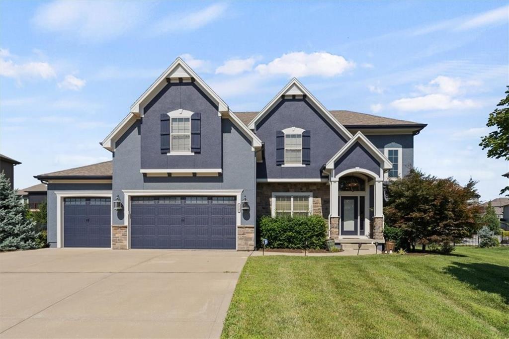 216 Ansel Adams Lee's Summit, MO 64081 - Photo 1 of 35