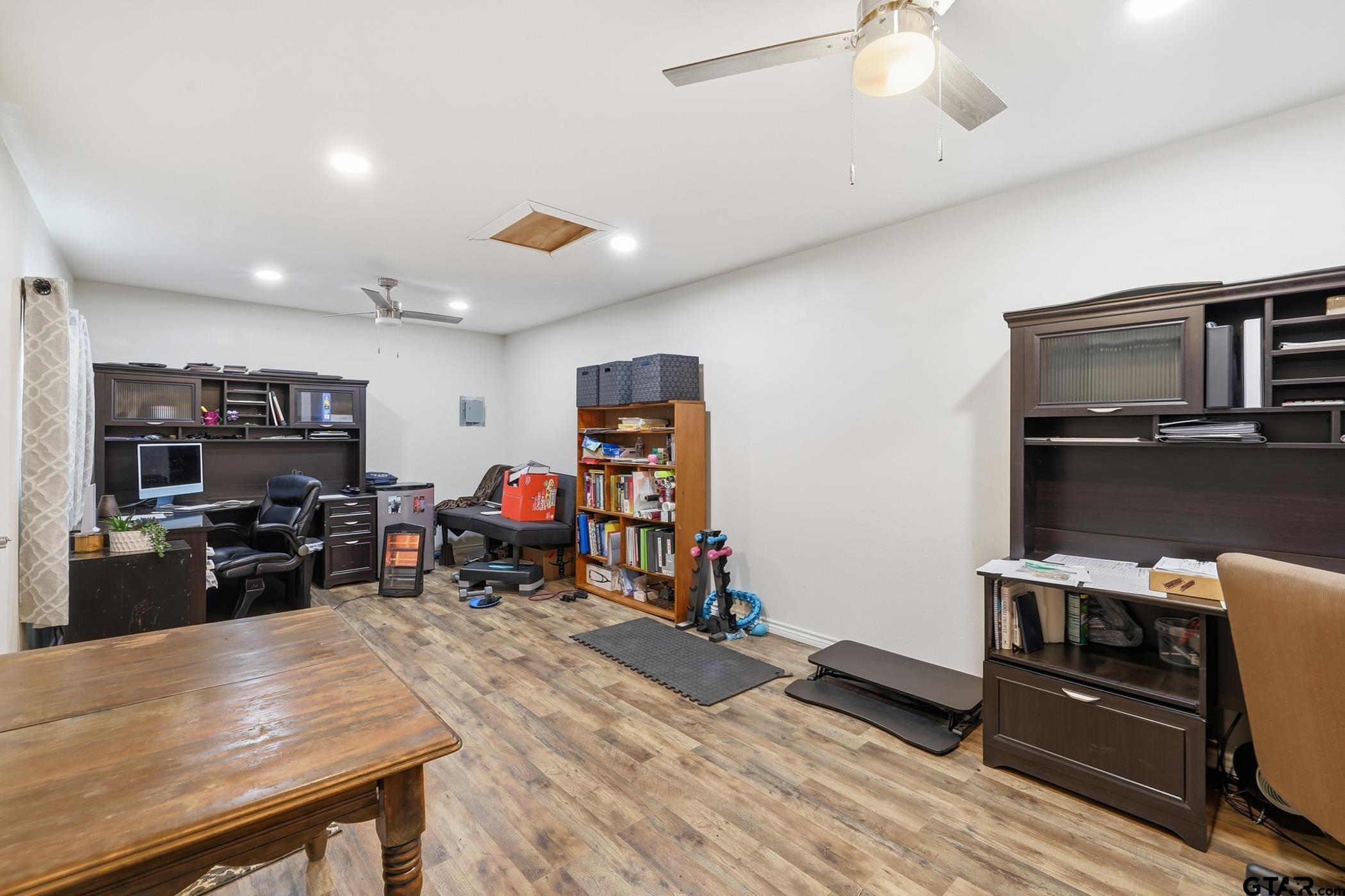847 Calloway Road Marshall, TX 75670 - Photo 26 of 33 a living room with furniture and a flat screen tv