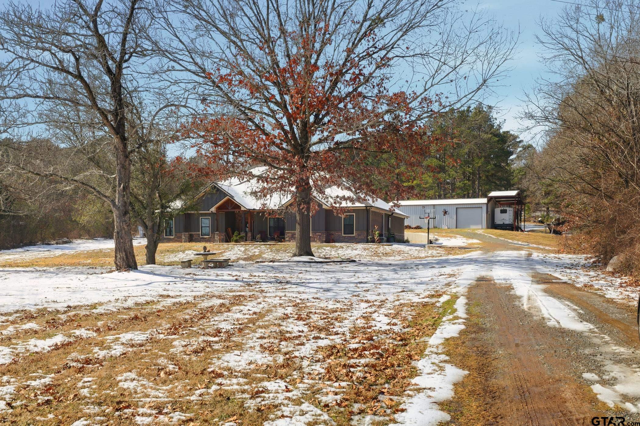 847 Calloway Road Marshall, TX 75670 - Photo 29 of 33 a view of a yard with a tree