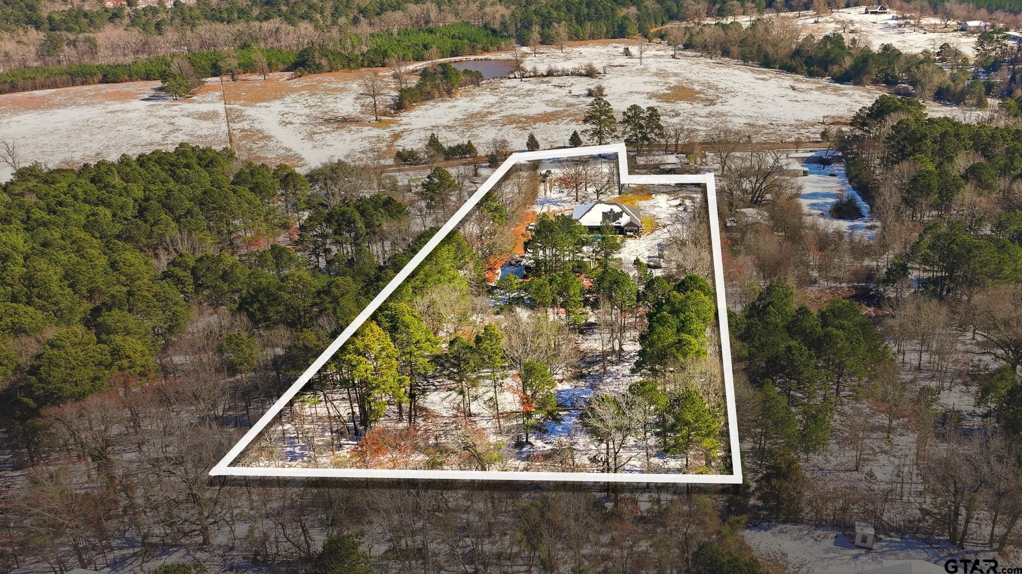 847 Calloway Road Marshall, TX 75670 - Photo 32 of 33 a view of a back yard