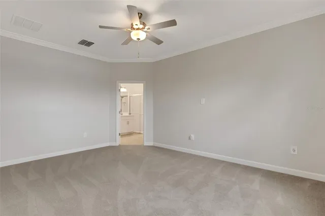 a view of an empty room with a fireplace