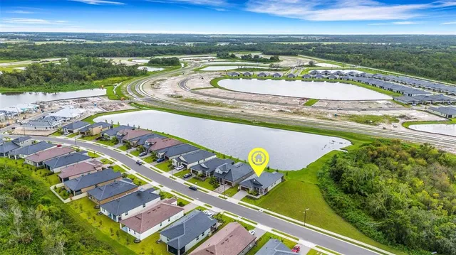 a kitchen with stainless steel appliances a refrigerator stove microwave and sink