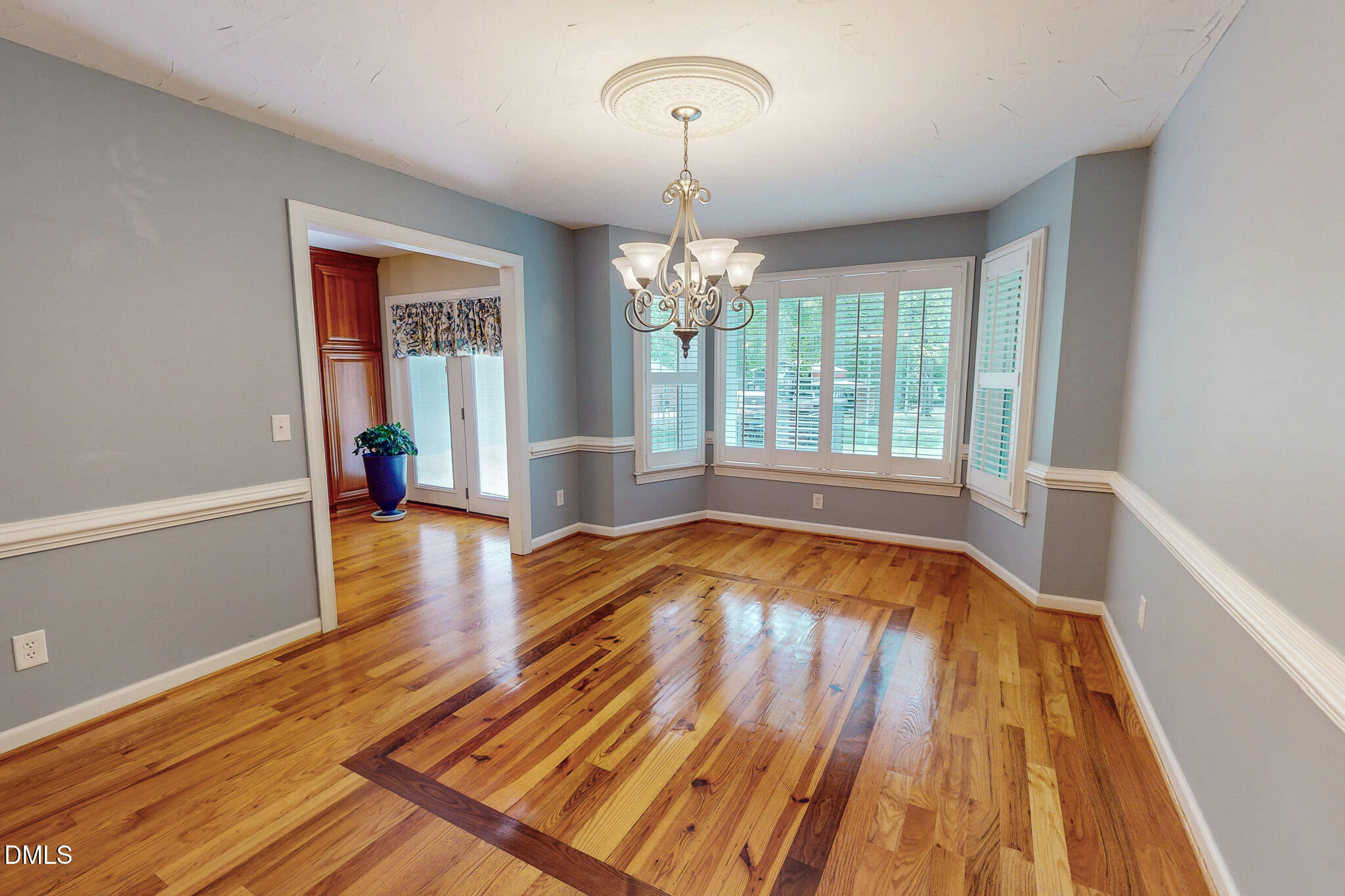 2428 Helena Moriah Road Timberlake, NC 27583 - Photo 15 of 73 a view of empty room with wooden floor and fan