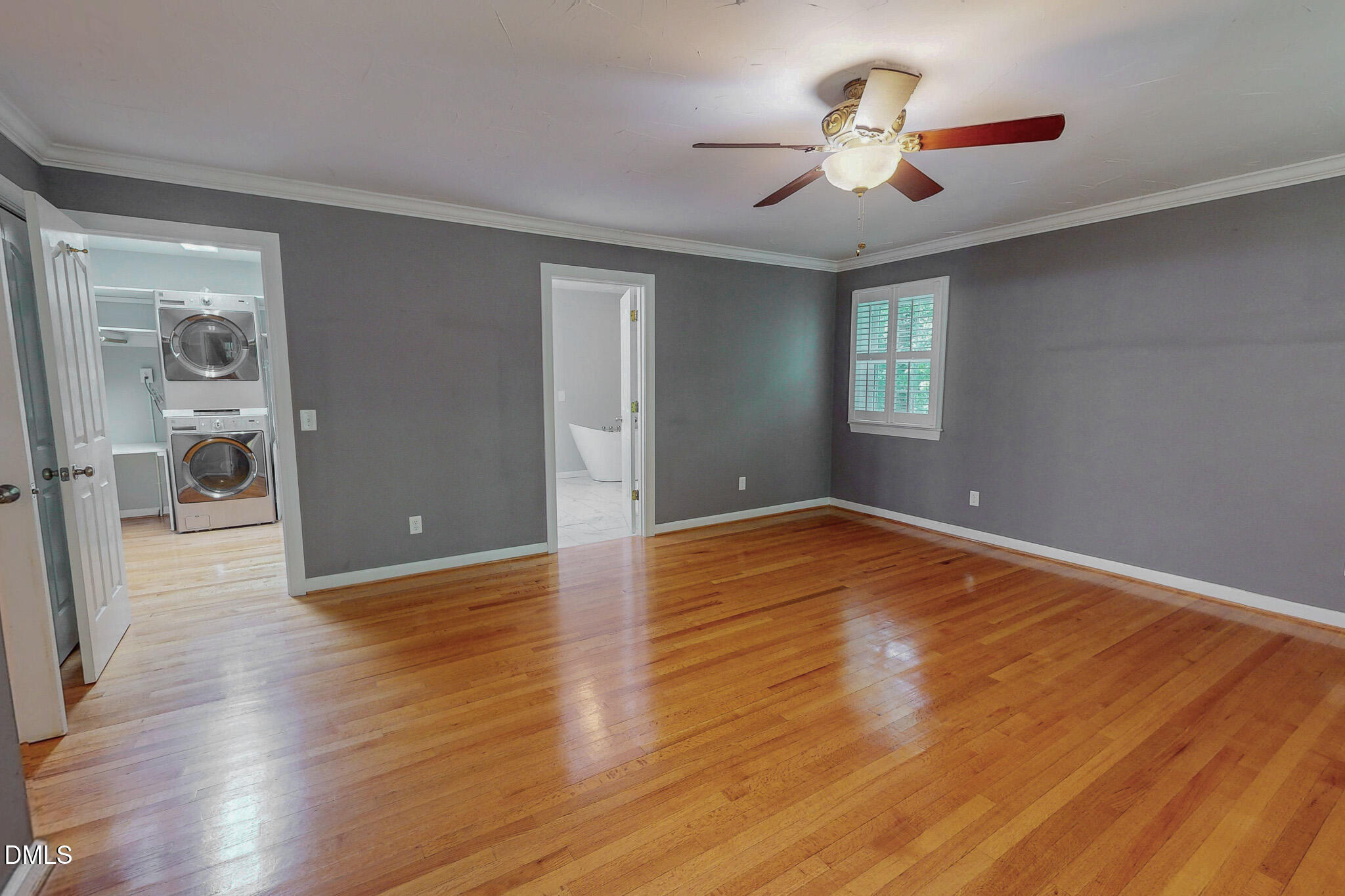 2428 Helena Moriah Road Timberlake, NC 27583 - Photo 17 of 73 a view of empty room with wooden floor and fan