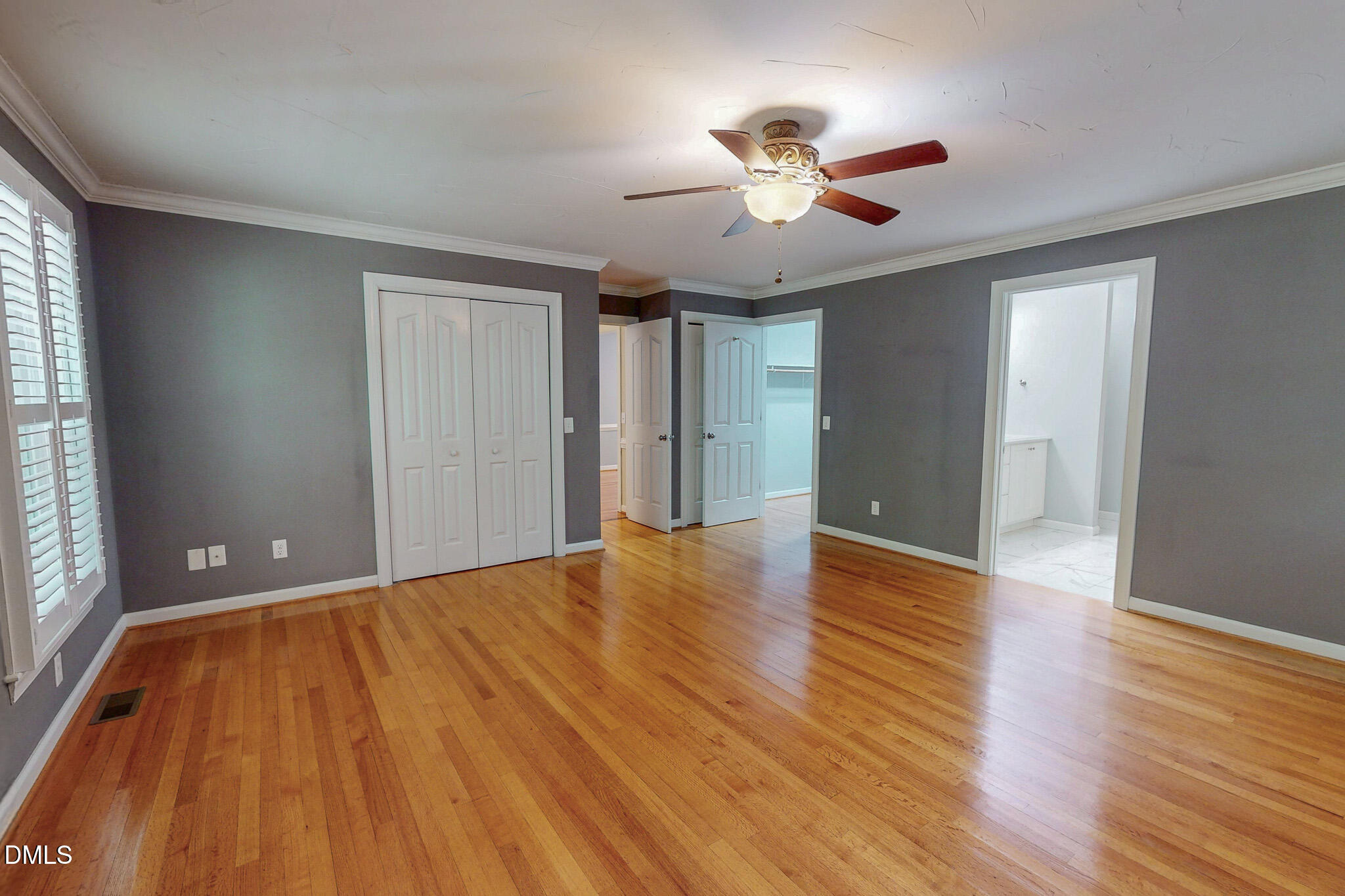 2428 Helena Moriah Road Timberlake, NC 27583 - Photo 18 of 73 a view of an empty room with wooden floor and a window