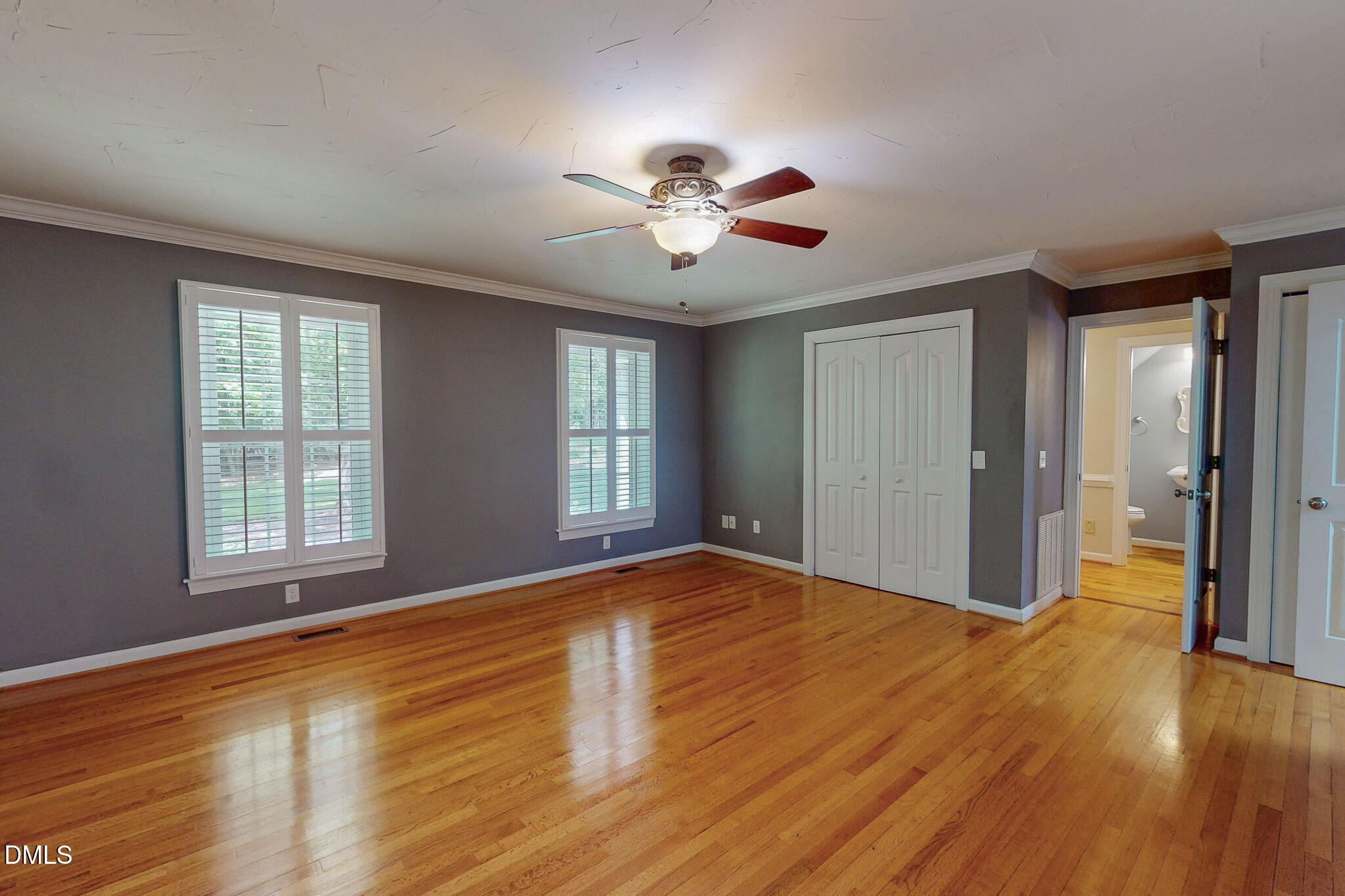 2428 Helena Moriah Road Timberlake, NC 27583 - Photo 26 of 73 a view of an empty room with window and wooden floor