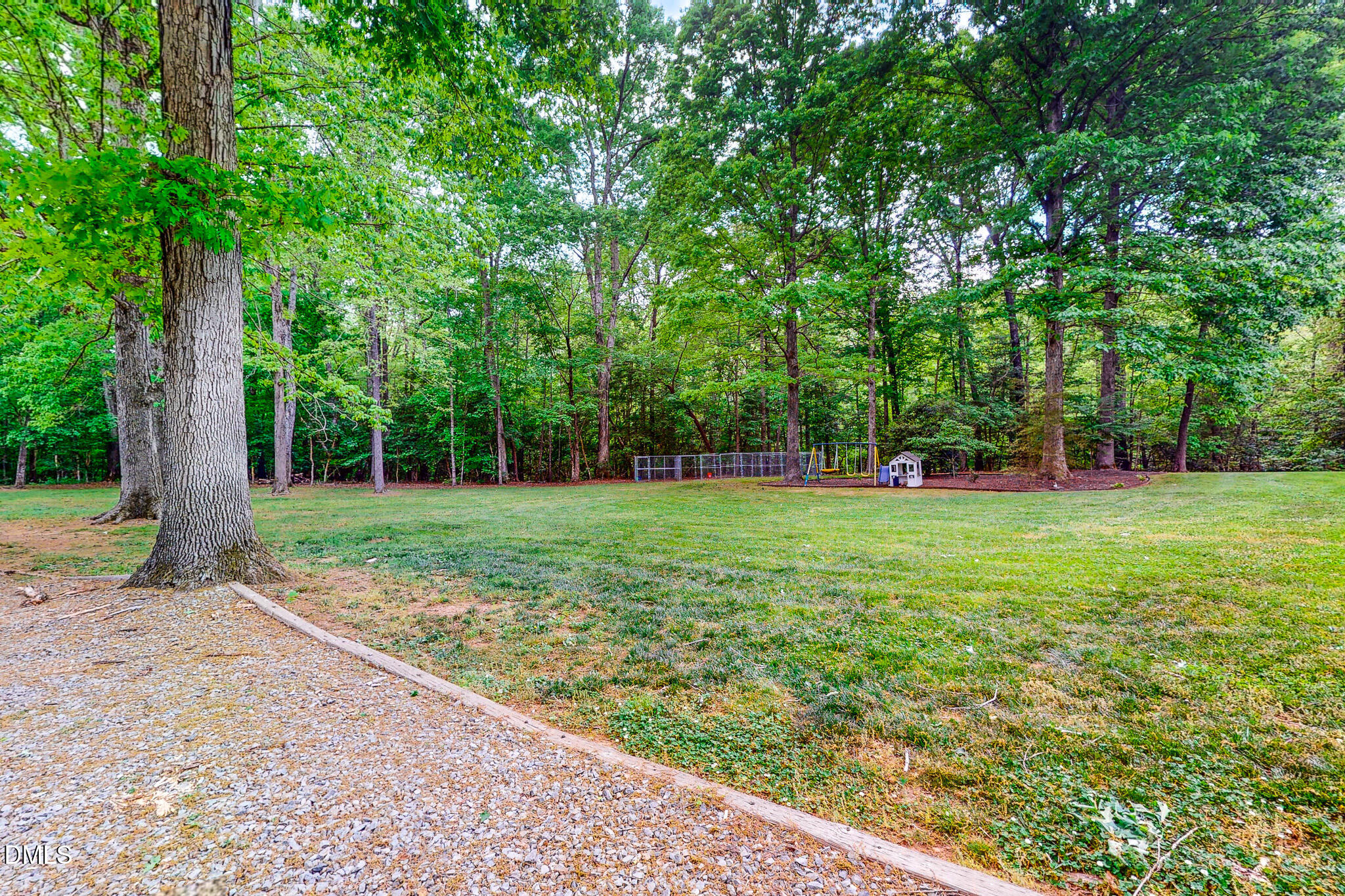 2428 Helena Moriah Road Timberlake, NC 27583 - Photo 34 of 73 a view of a park with large trees