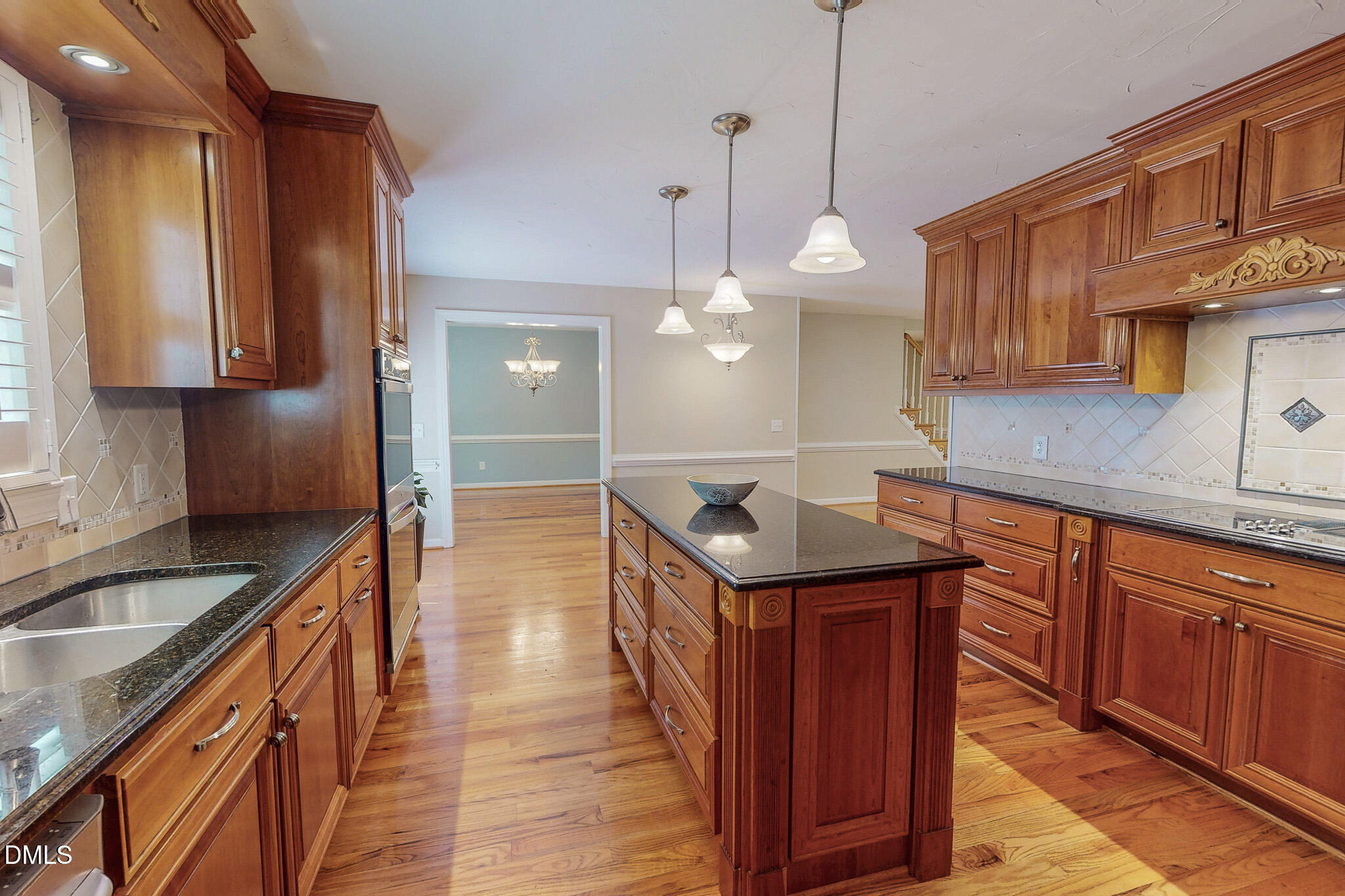 2428 Helena Moriah Road Timberlake, NC 27583 - Photo 38 of 73 a kitchen with a sink stove and cabinets
