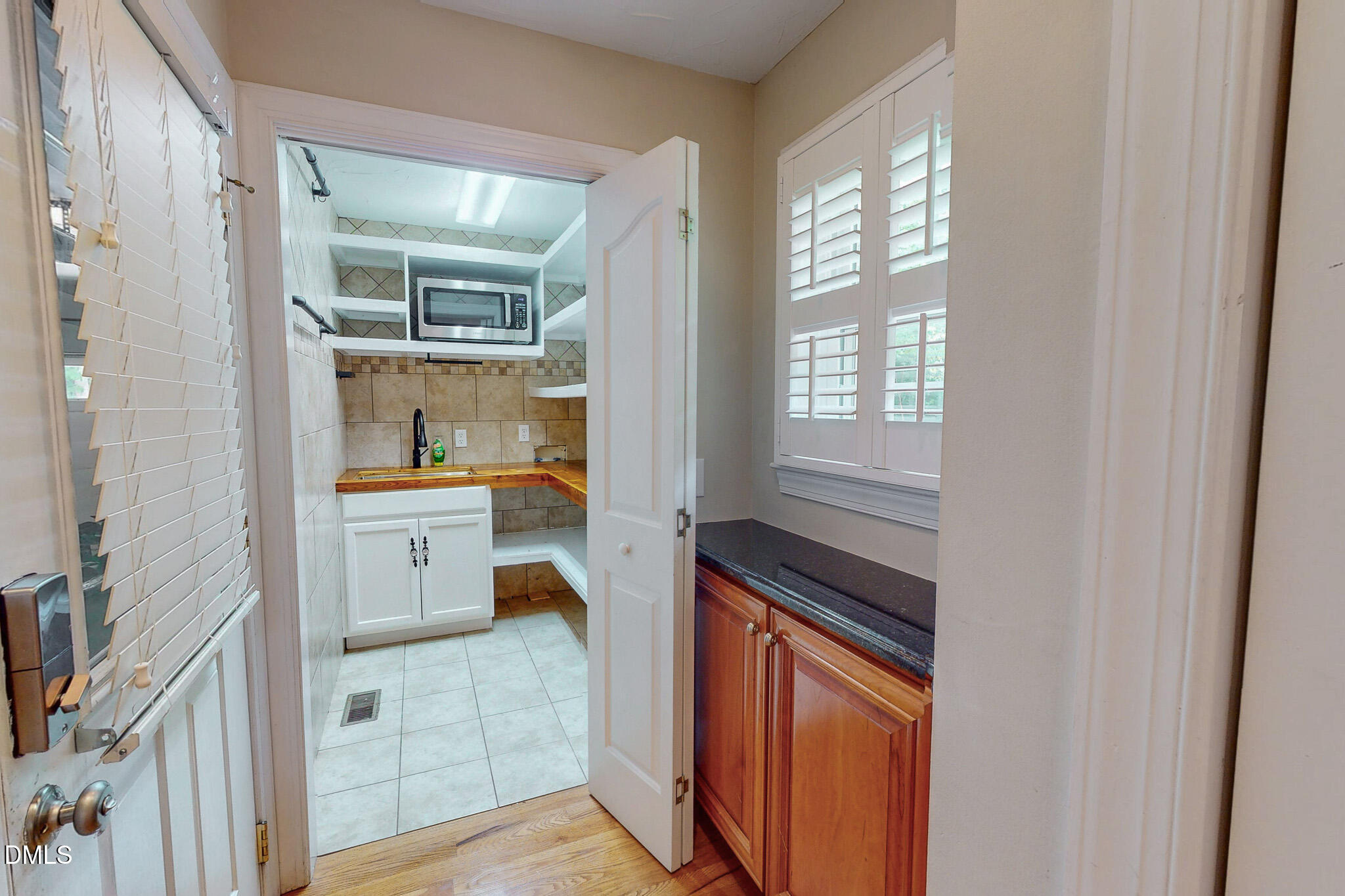 2428 Helena Moriah Road Timberlake, NC 27583 - Photo 41 of 73 a kitchen with a refrigerator and a stove
