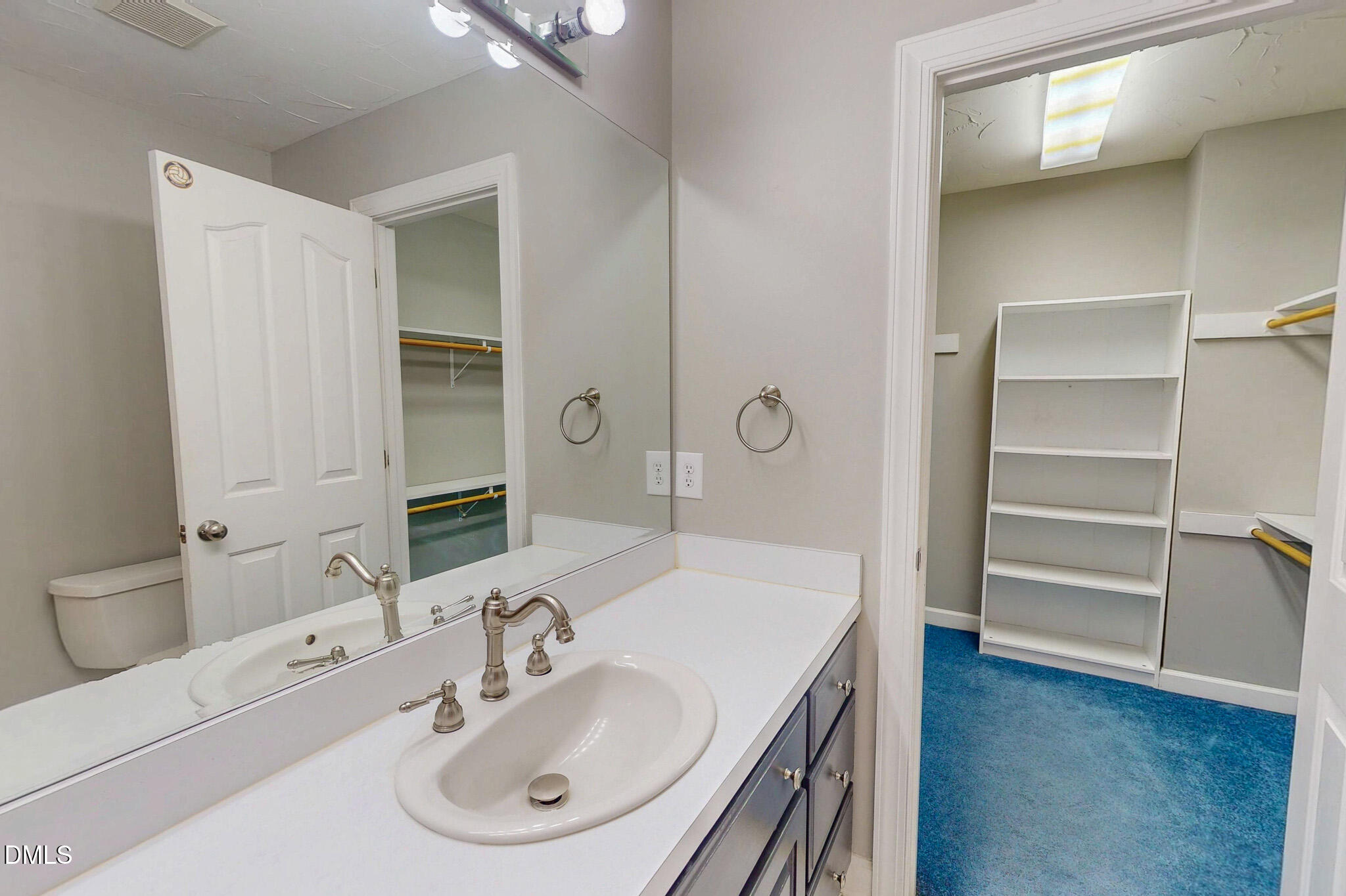 2428 Helena Moriah Road Timberlake, NC 27583 - Photo 58 of 73 a bathroom with a sink and a mirror