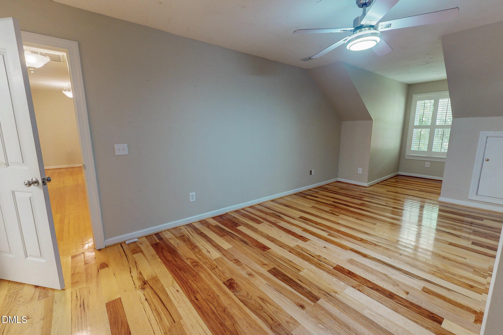 2428 Helena Moriah Road Timberlake, NC 27583 - Photo 65 of 73 a view of a room with wooden floor and fan