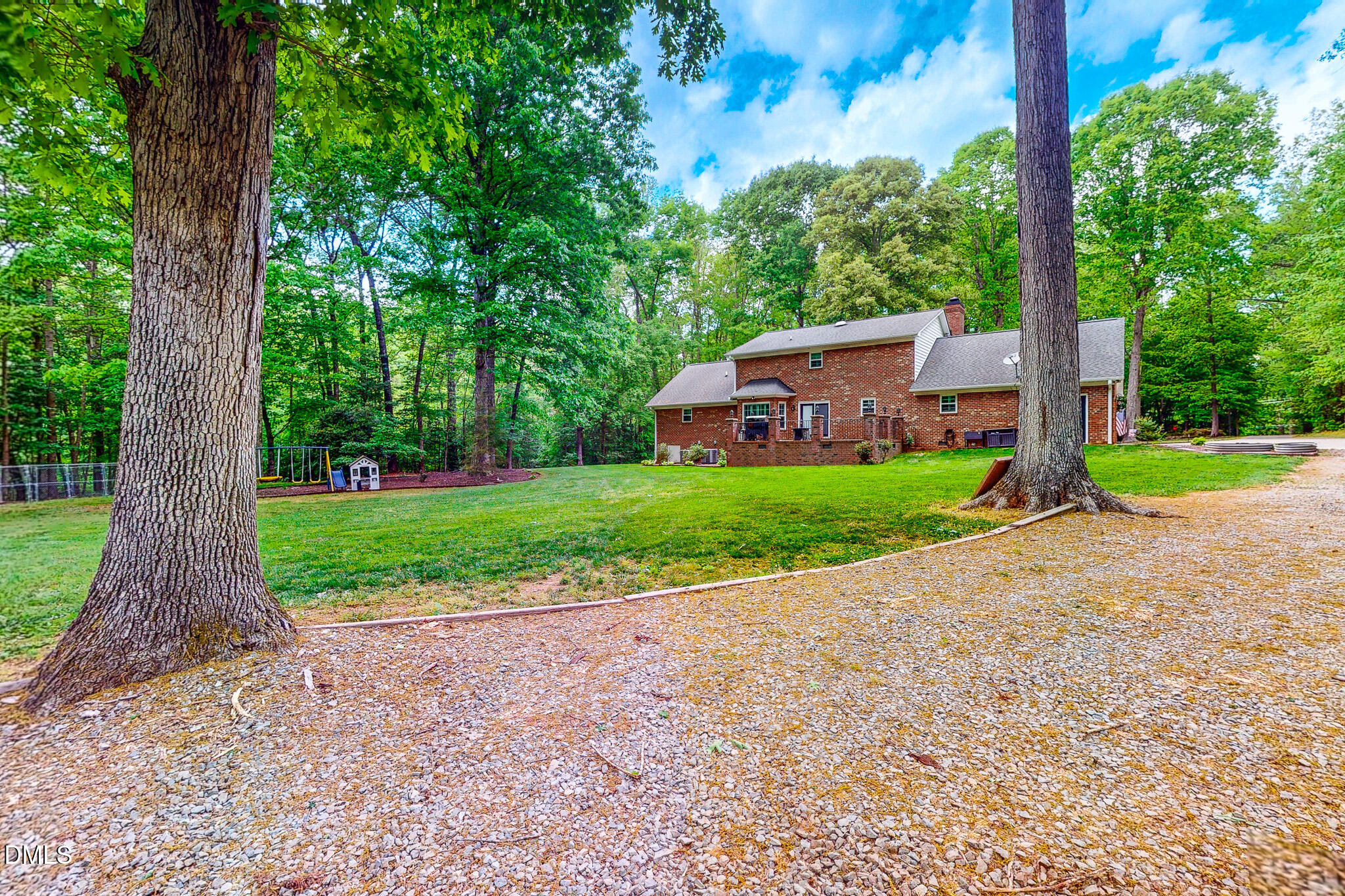 2428 Helena Moriah Road Timberlake, NC 27583 - Photo 8 of 73 a view of a house with backyard and garden
