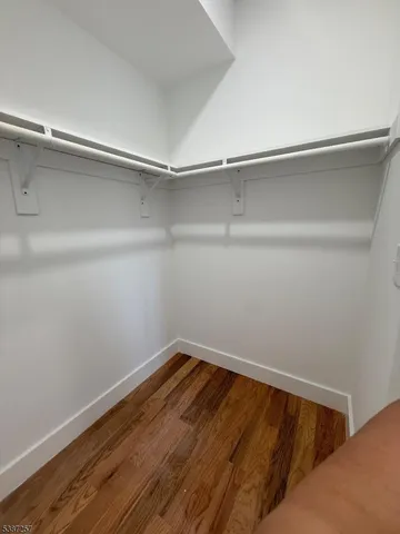 a view of small space with racks on the wall