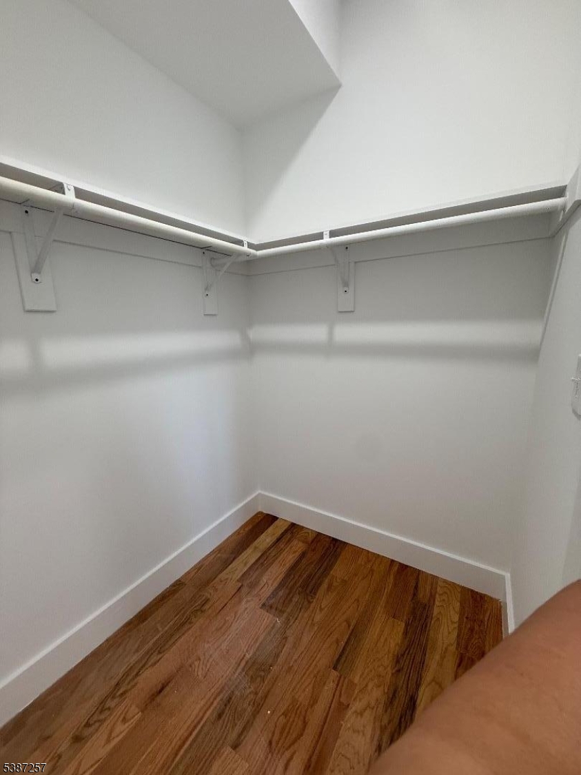 715 South 17th Street, Unit 2 Newark, NJ 07103 - Photo 15 of 24 a view of small space with racks on the wall