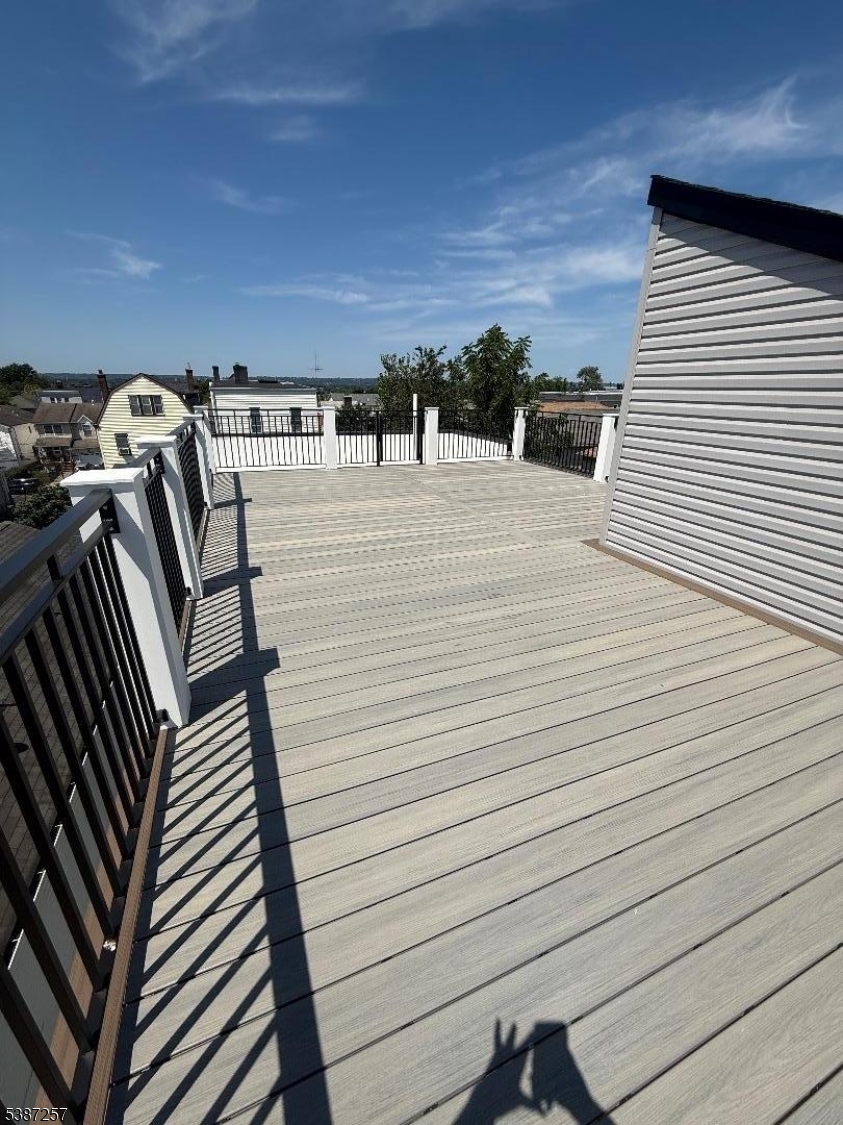 715 South 17th Street, Unit 2 Newark, NJ 07103 - Photo 21 of 24 a view of a terrace with wooden floor